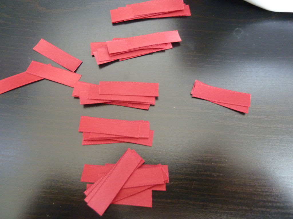 Small red ribbons pieces