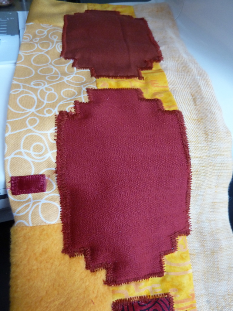 One red ribbon sewn down